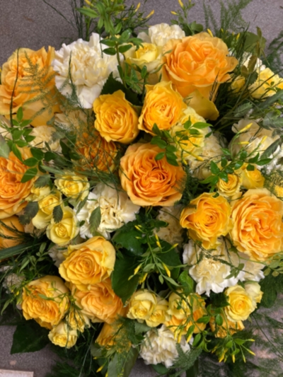 Yellow and white funeral flowers Eastbourne 