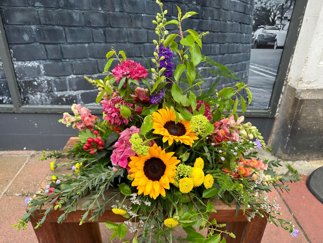 Country garden funeral posy 