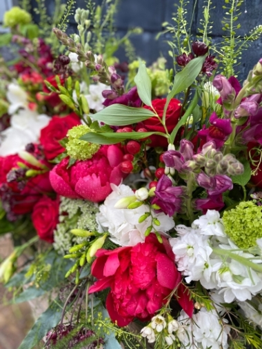 Red and White country garden coffin tribute