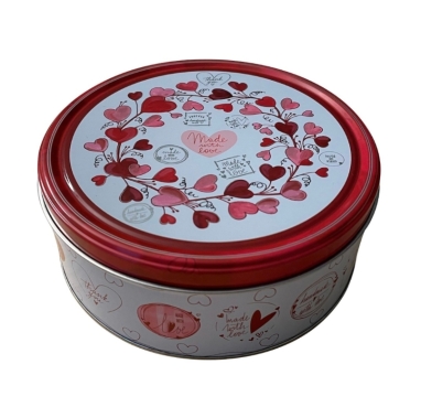 Assorted I love you themed tins with assorted cookies